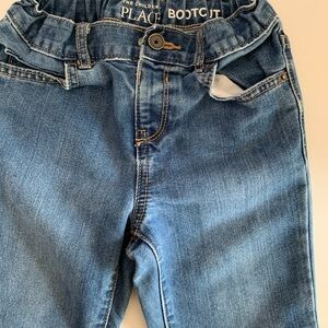 The Children’s Place Size 5T blue jeans with waist adjustable.